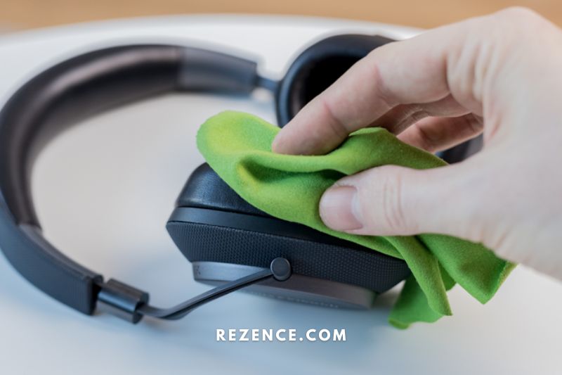 Look for dirt or debris in the meshes of your headset speakers or earbuds. Clear out each orifice gently with a soft-bristled brush until no debris remains.
